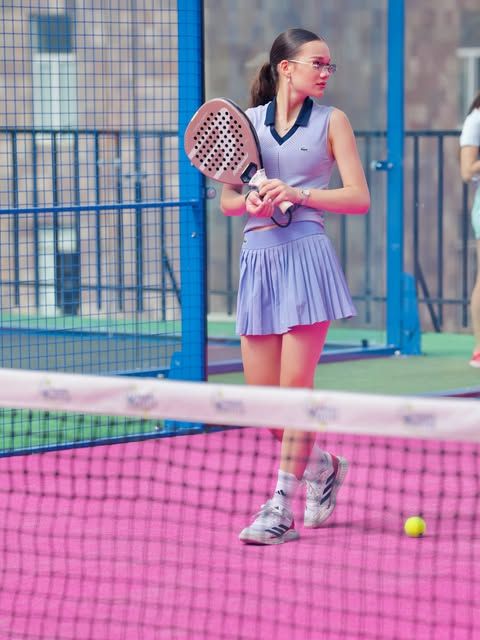 Player on the pink court at the Grand Opening