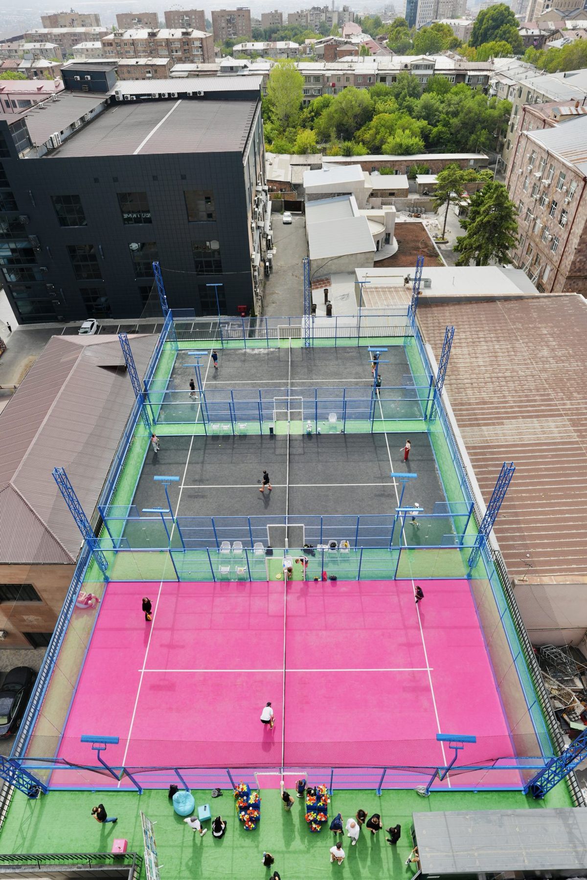 Pink outdoor court on the roof, seen from above