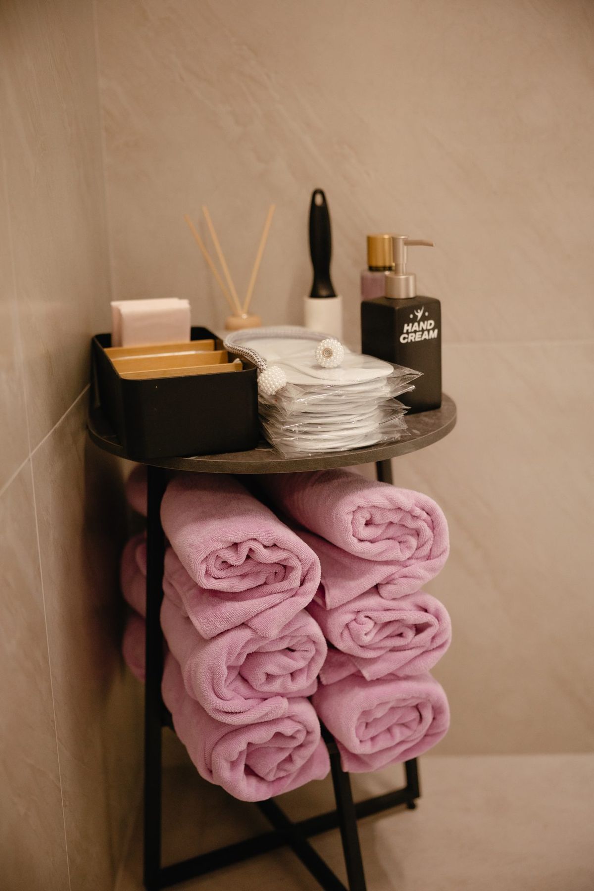 Pink towels on a stand in the changing room
